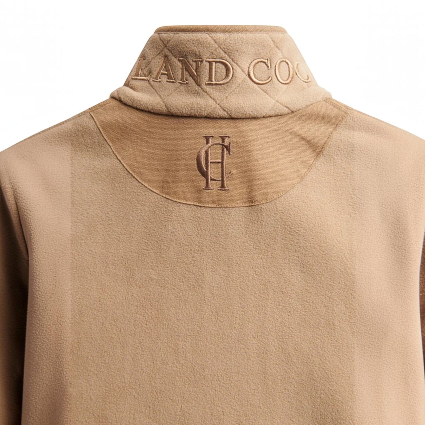 Close-up back view of a camel-colored fleece pullover sweater with a quilted neck collar. The collar features embroidered text reading 'LAND CO' and a matching embroidered monogram logo on the upper back.