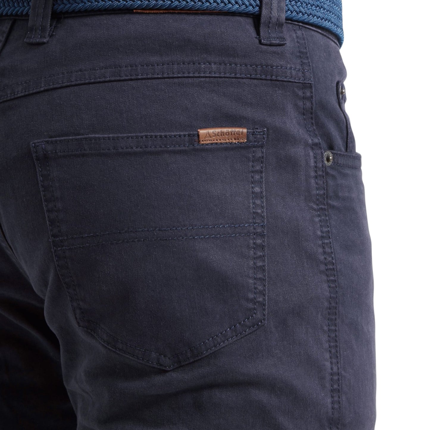 Navy blue pants with a brand label on the pocket against a white background