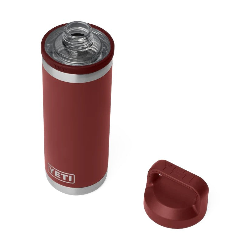 A YETI insulated tumbler in matte burgundy red with silver metal trim, shown with its matching burgundy cap off and placed beside it on a clean white background.