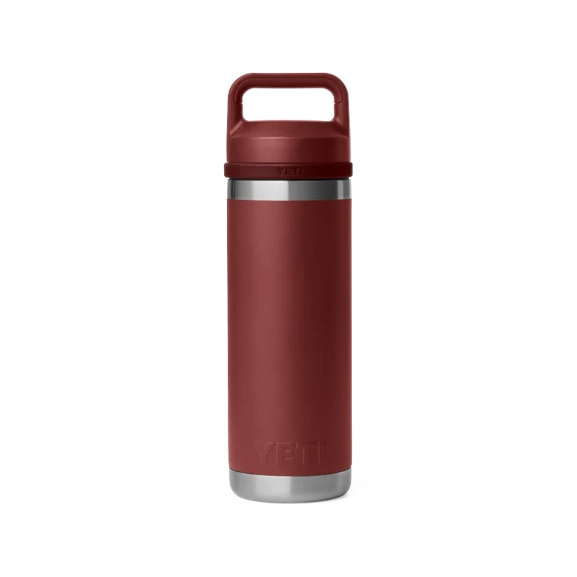 A YETI insulated travel tumbler in a matte burgundy red color, featuring a stainless steel rim and base, on a solid white background.