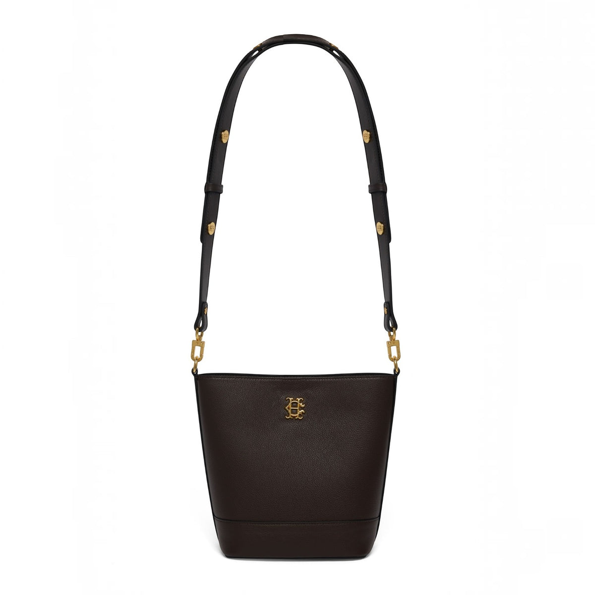 A dark brown leather shoulder bag with a black strap and gold-tone hardware, featuring a small gold monogram logo on the front, set against a plain white background.