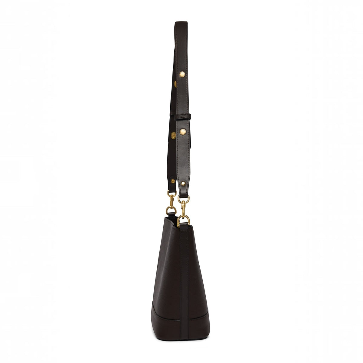 A dark brown leather shoulder bag shown from the side profile against a solid white background, featuring a long adjustable strap with gold-tone rivets and hardware.
