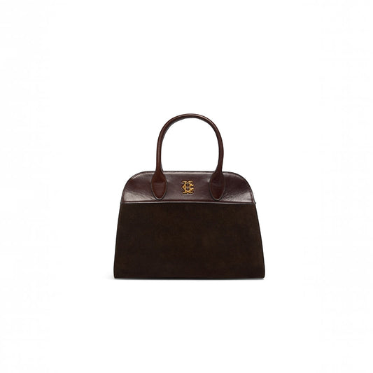 A dark brown leather handbag with a structured dome shape, dual top handles, and a small gold-tone logo clasp on the front, set against a plain white background.