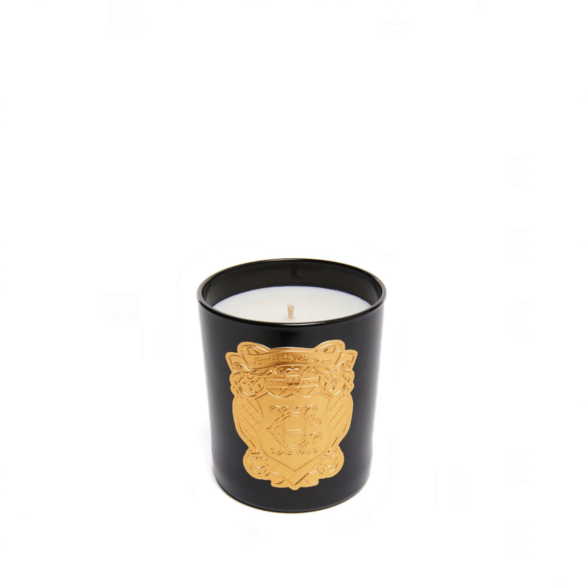 A black glass jar candle with a white wax fill and a prominent gold crest emblem on the front, set against a plain white background.