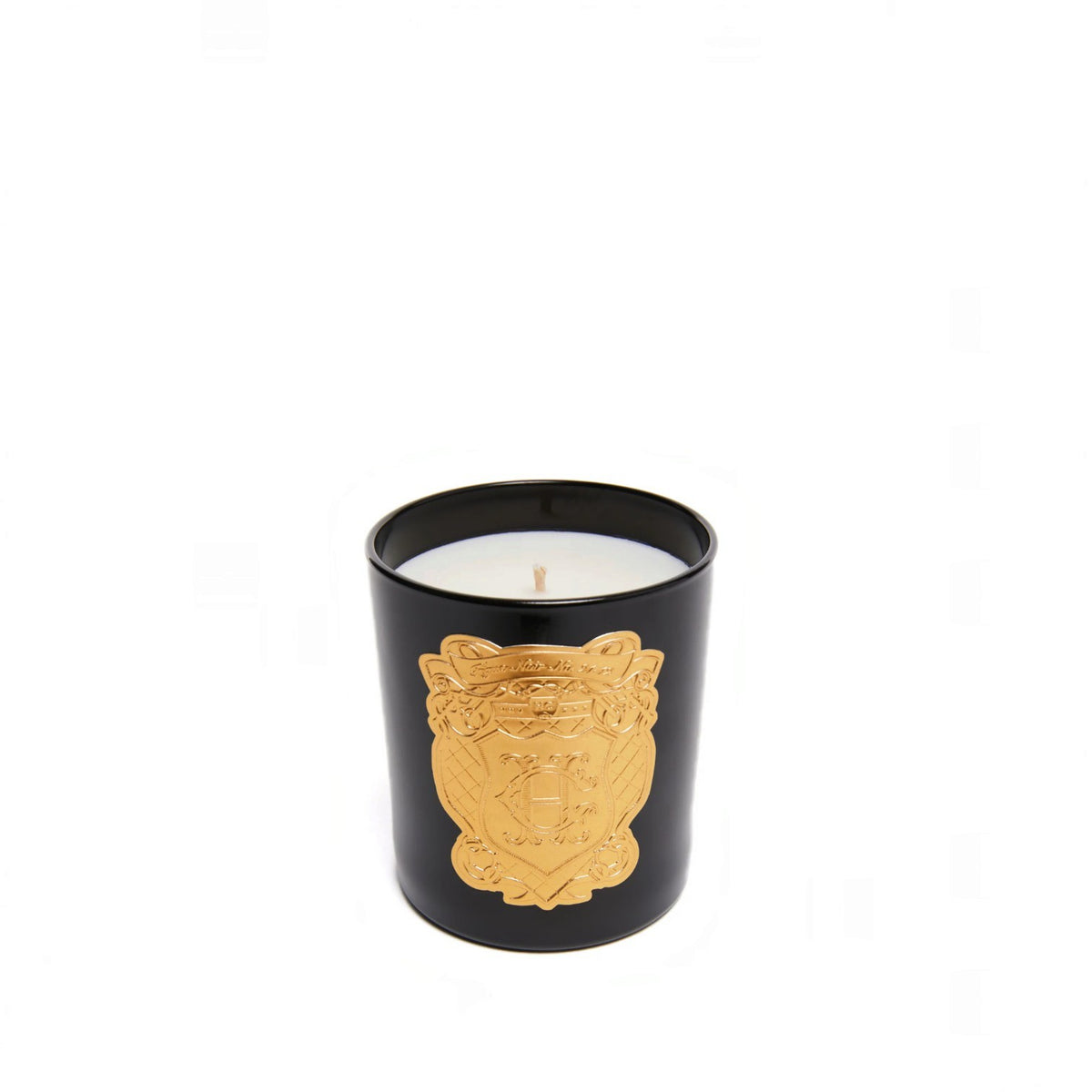 A black glass jar candle with a white wax fill and a prominent gold crest emblem on the front, set against a plain white background.