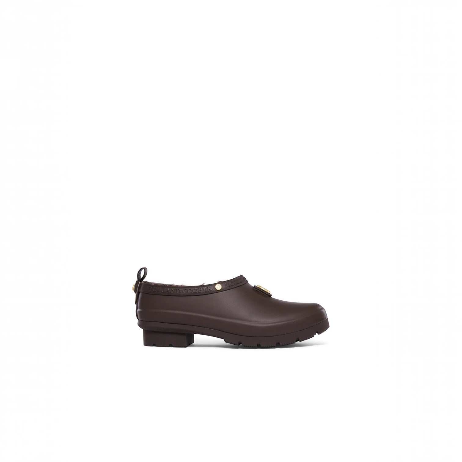 Brown leather mule shoe on a white background