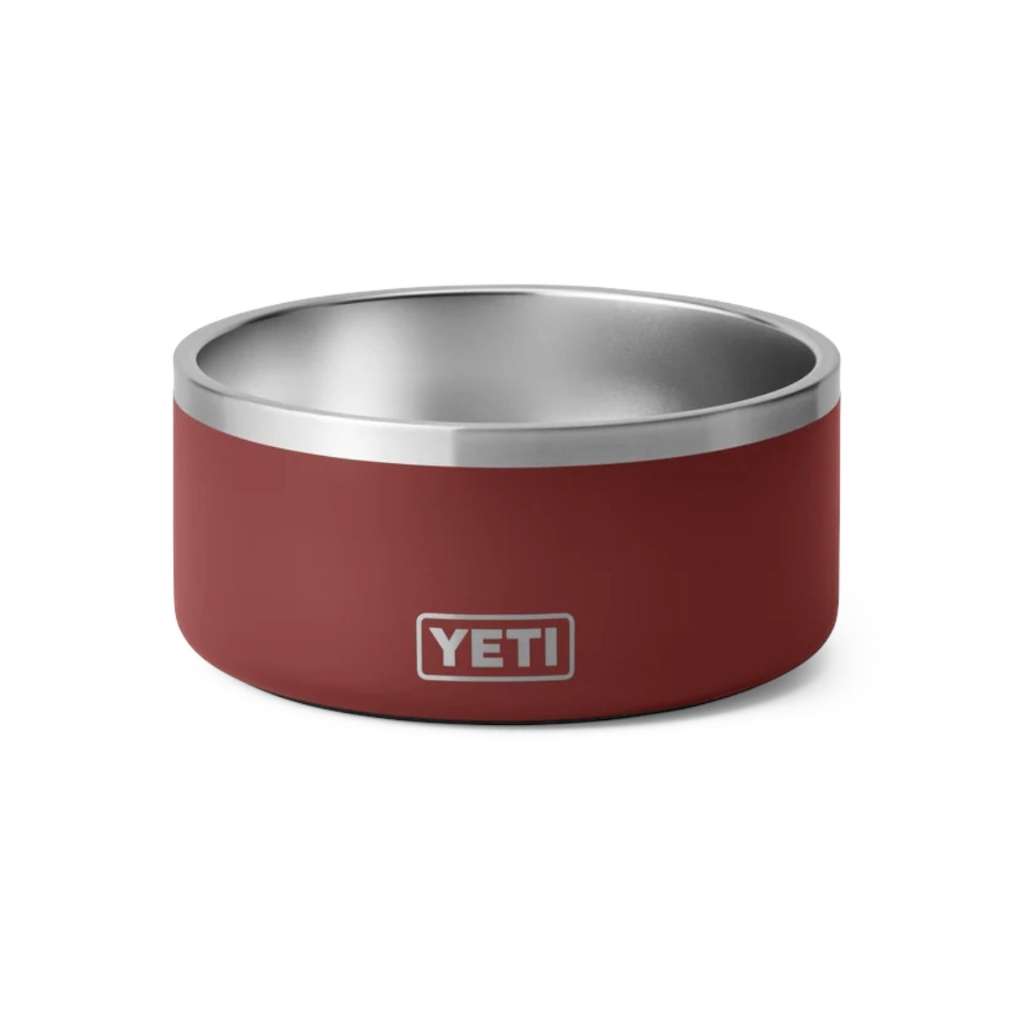 A YETI dog bowl in a matte dark red finish with a polished stainless steel interior and rim, featuring the silver YETI logo on the front, set against a plain white background.