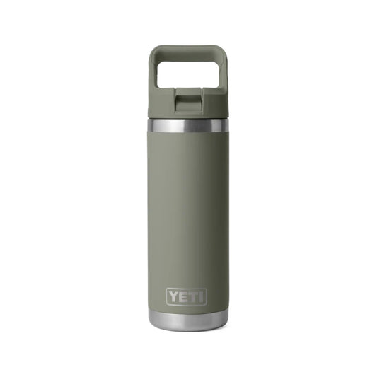 A YETI insulated travel tumbler in sage green with a matching green lid and handle, featuring a silver stainless steel band and base, on a solid white background.