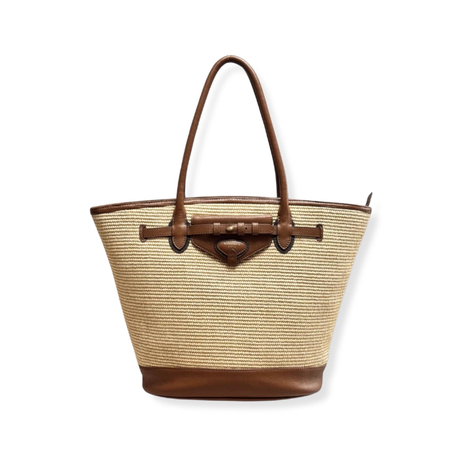 Woven tote bag with brown leather accents on a white background