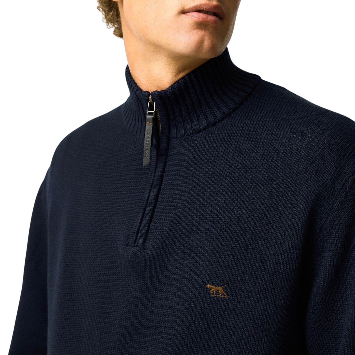 Navy blue sweater with a small logo on a white background