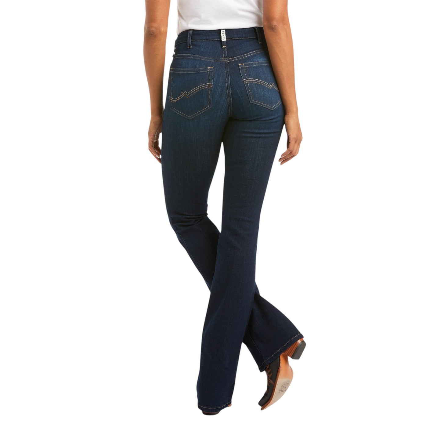 Person wearing blue jeans on a white background