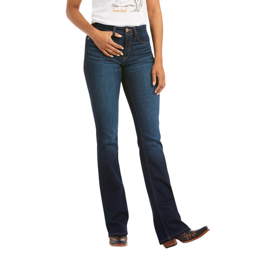 Person wearing blue jeans on a white background
