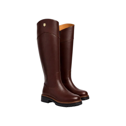A pair of dark brown leather knee-high riding boots with black soles, shown from a three-quarter angle against a plain white background.