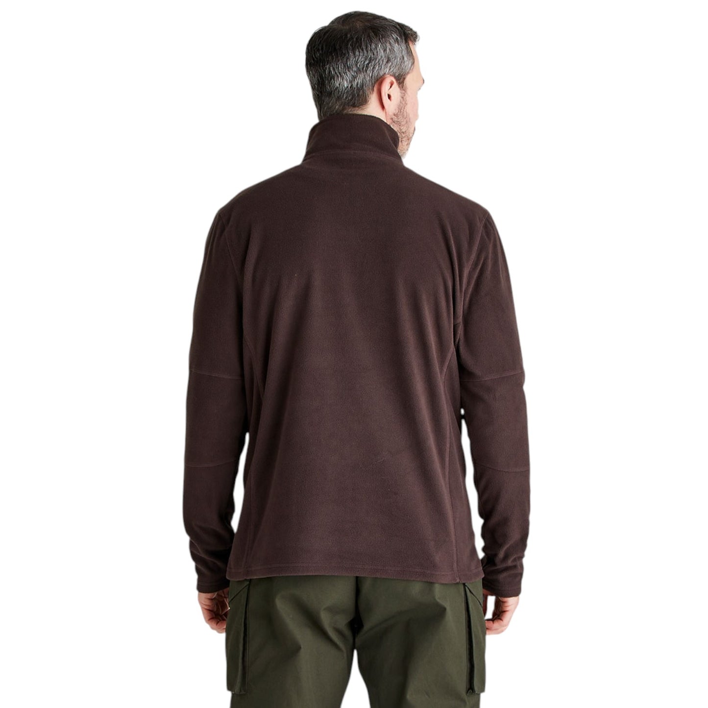 A man viewed from the back wearing a dark brown long-sleeve quarter-zip fleece pullover and olive green cargo pants, set against a plain white background.