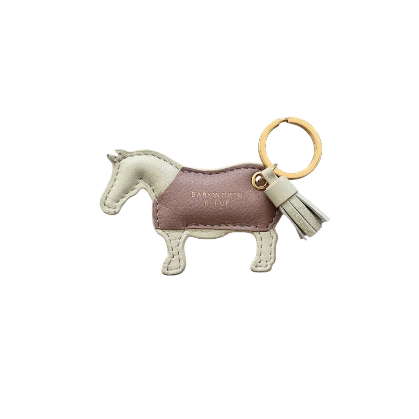 A horse-shaped leather keychain charm by Brandith Neeve, featuring a dusty rose center with cream-colored head, legs, and tail, attached to a gold-tone keyring and key fob on a white background.