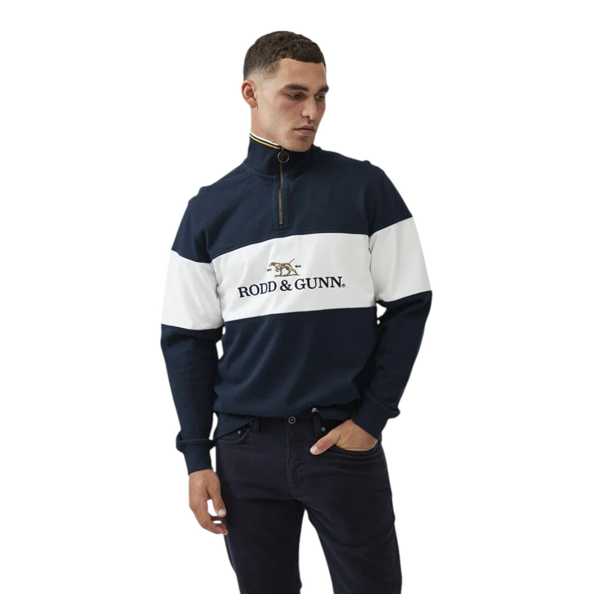 Man wearing a navy and white sweater with 'Rodd & Gunn' logo on a white background