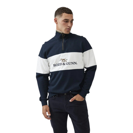 Man wearing a navy and white sweater with 'Rodd & Gunn' logo on a white background