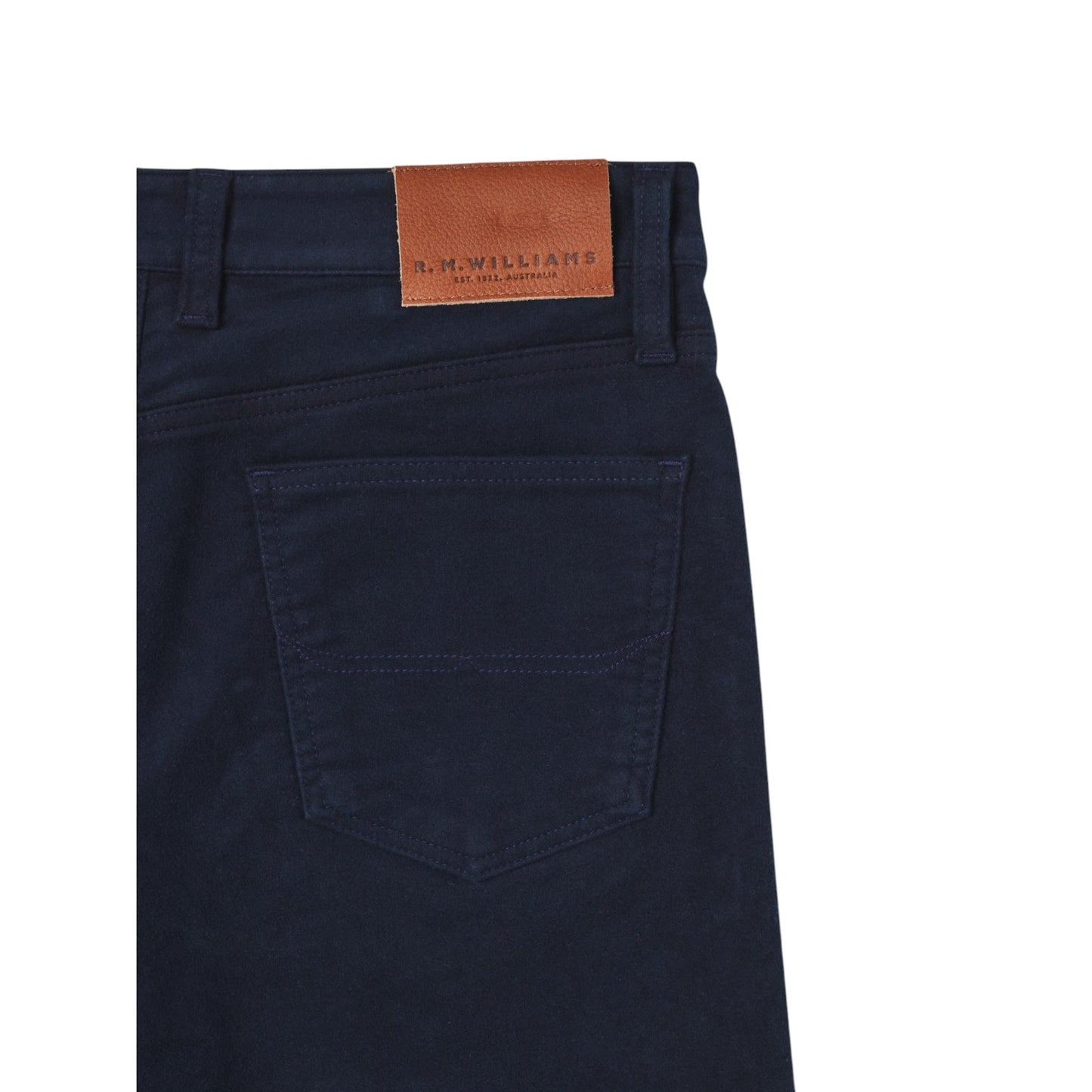 Navy blue pants with a brown leather label on a white background