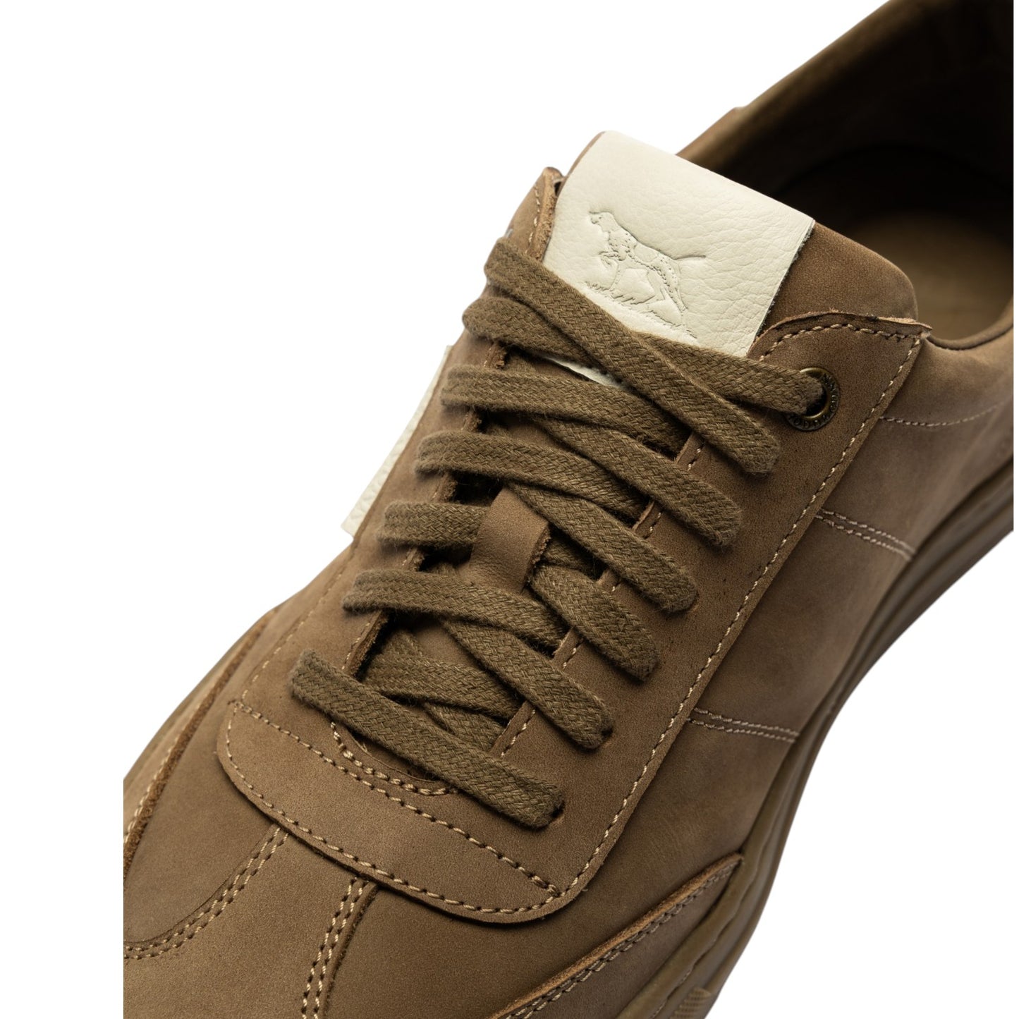 Brown sneaker with white lining on a white background