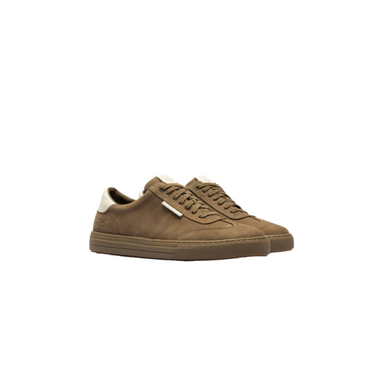 Black sneaker on a light gray background