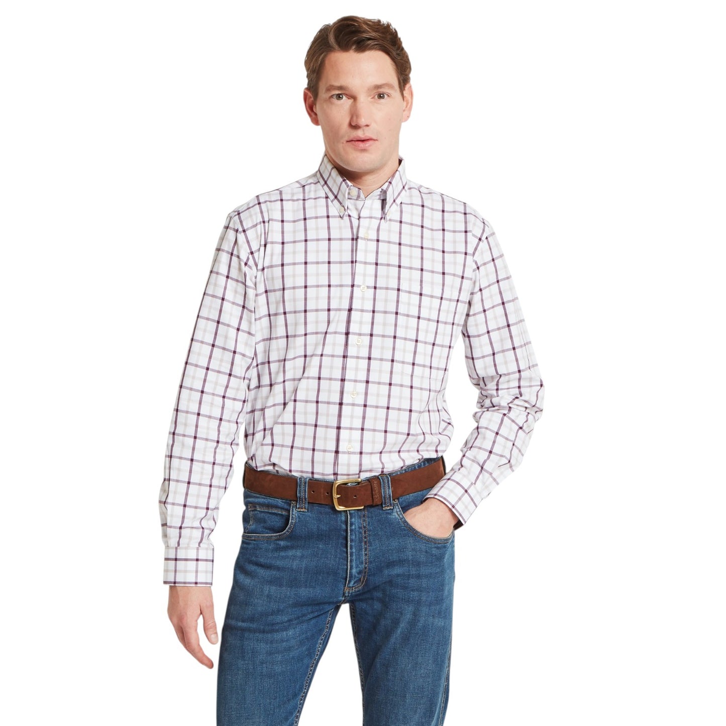 Man wearing a plaid shirt and jeans on a white background