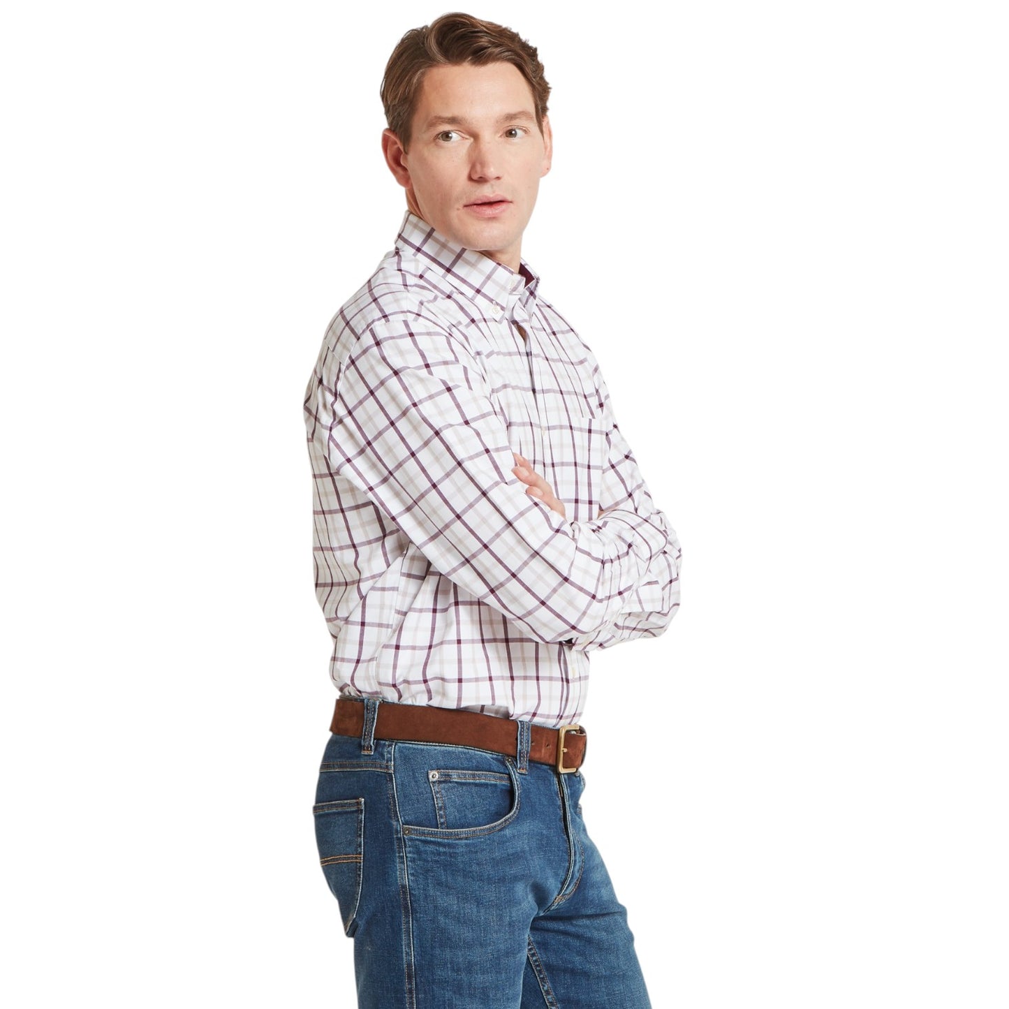 Man wearing a plaid shirt and jeans on a white background