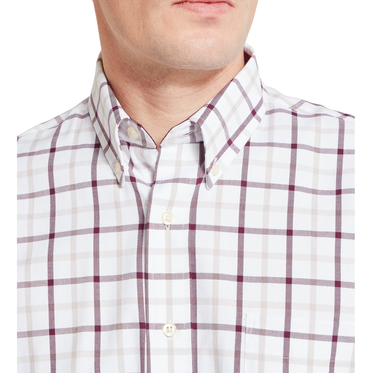 White shirt with red plaid pattern worn by a person on a white background