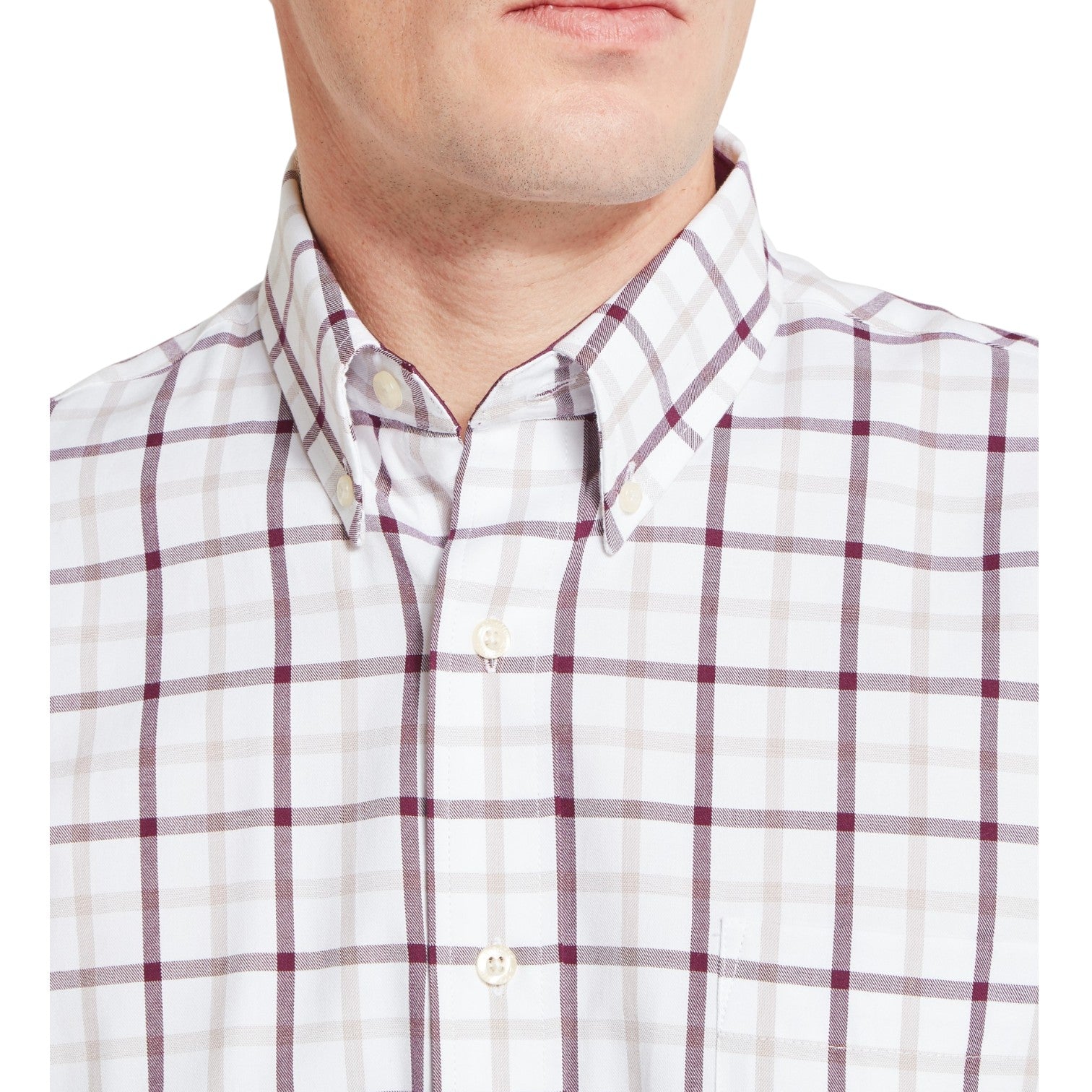 White shirt with red plaid pattern worn by a person on a white background