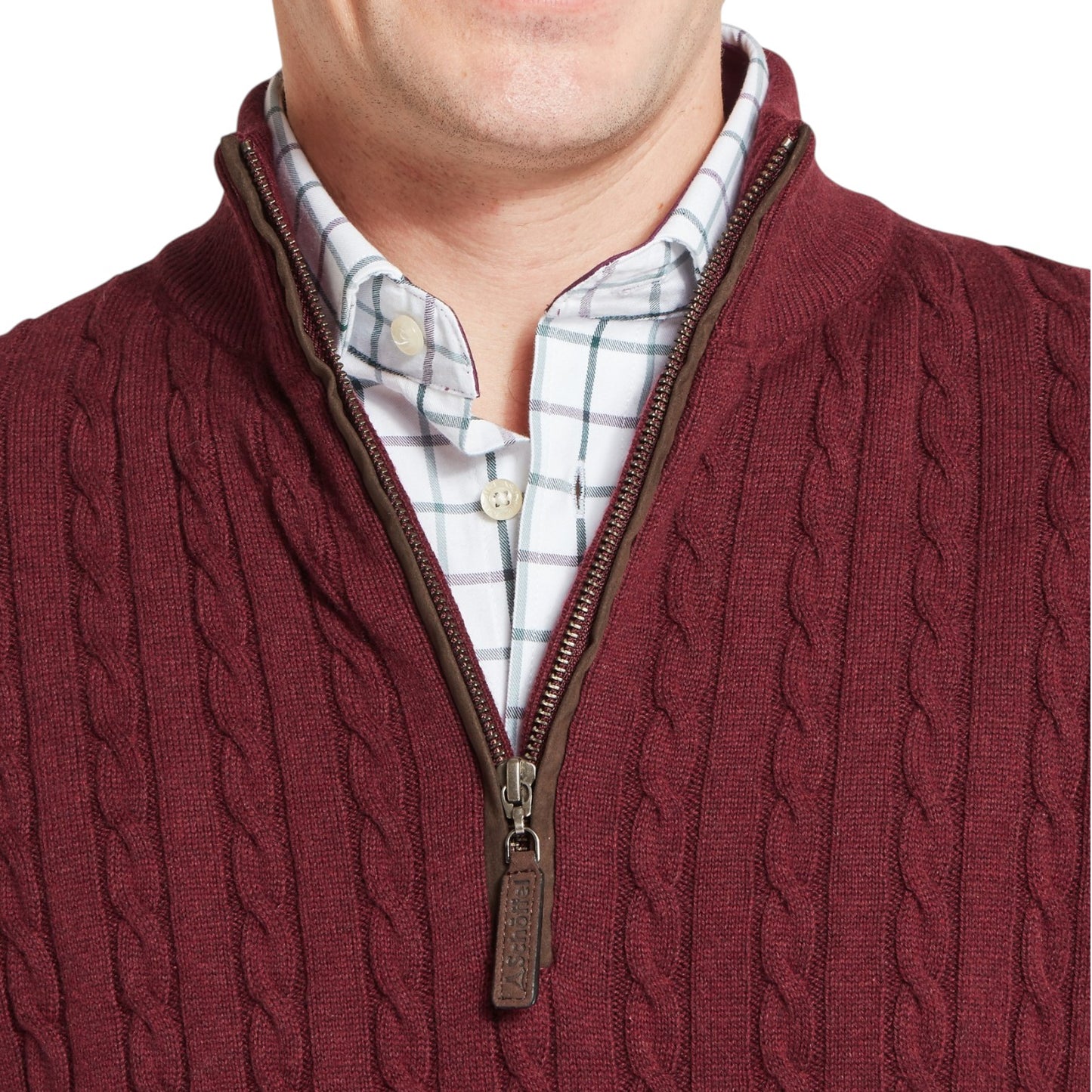 Maroon cable knit sweater with a zipper over a plaid shirt on a white background