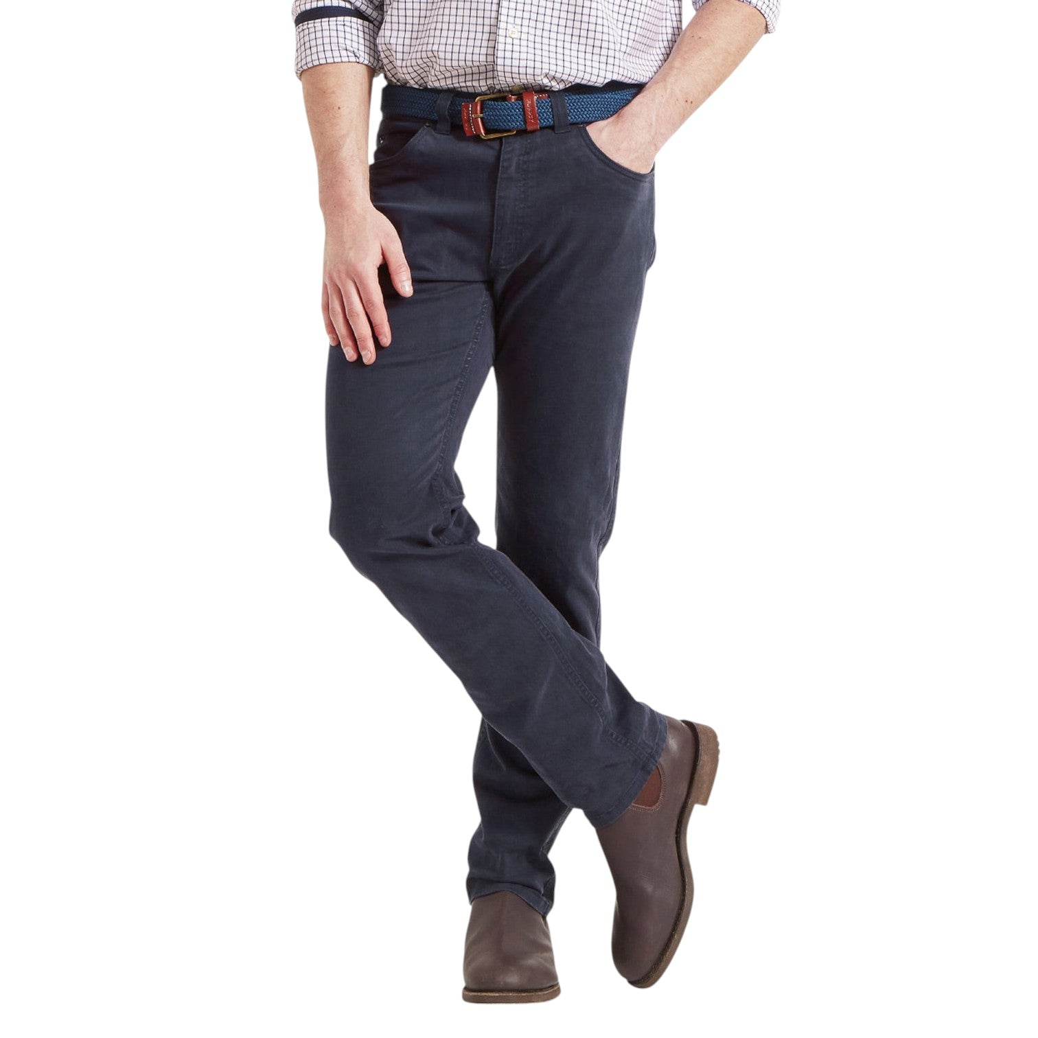Person wearing navy pants with a white background
