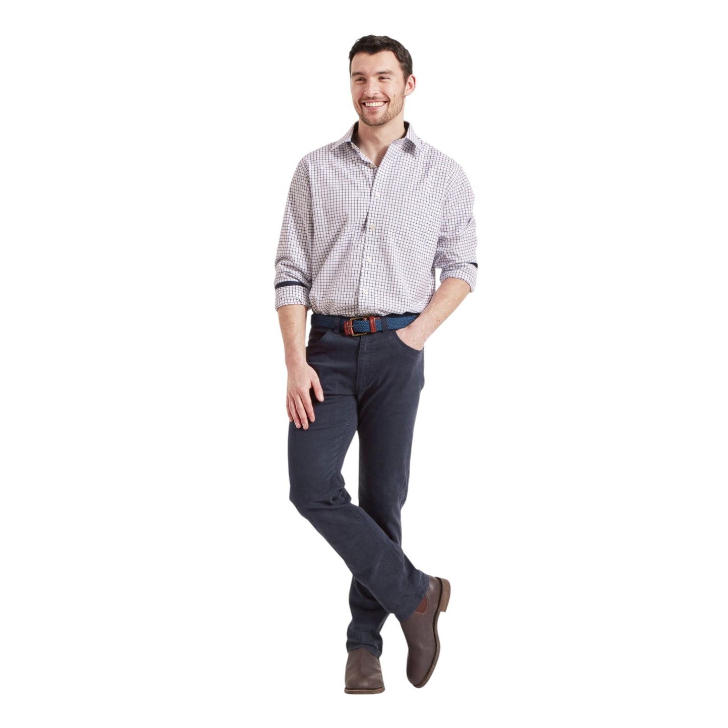 Man wearing a checkered shirt, dark pants, and brown shoes on a white background