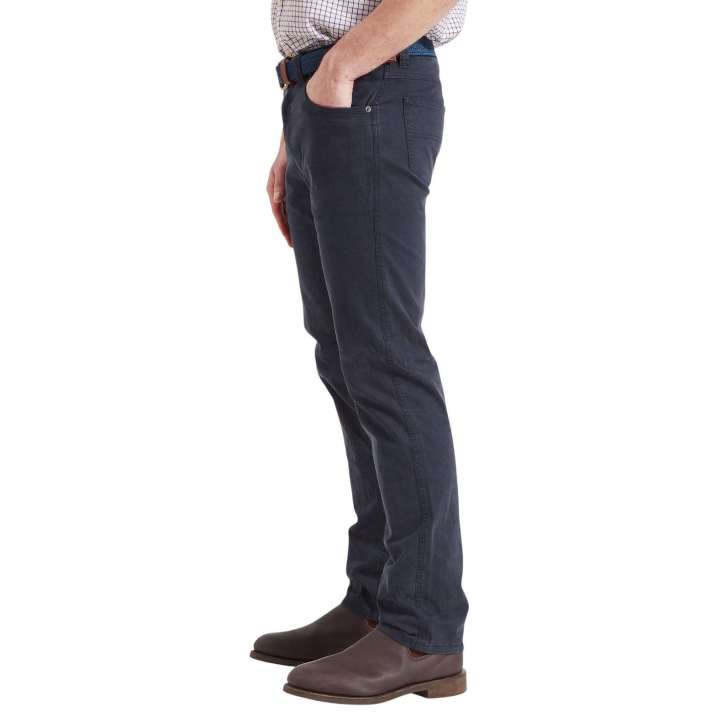 Person wearing dark blue pants on a white background