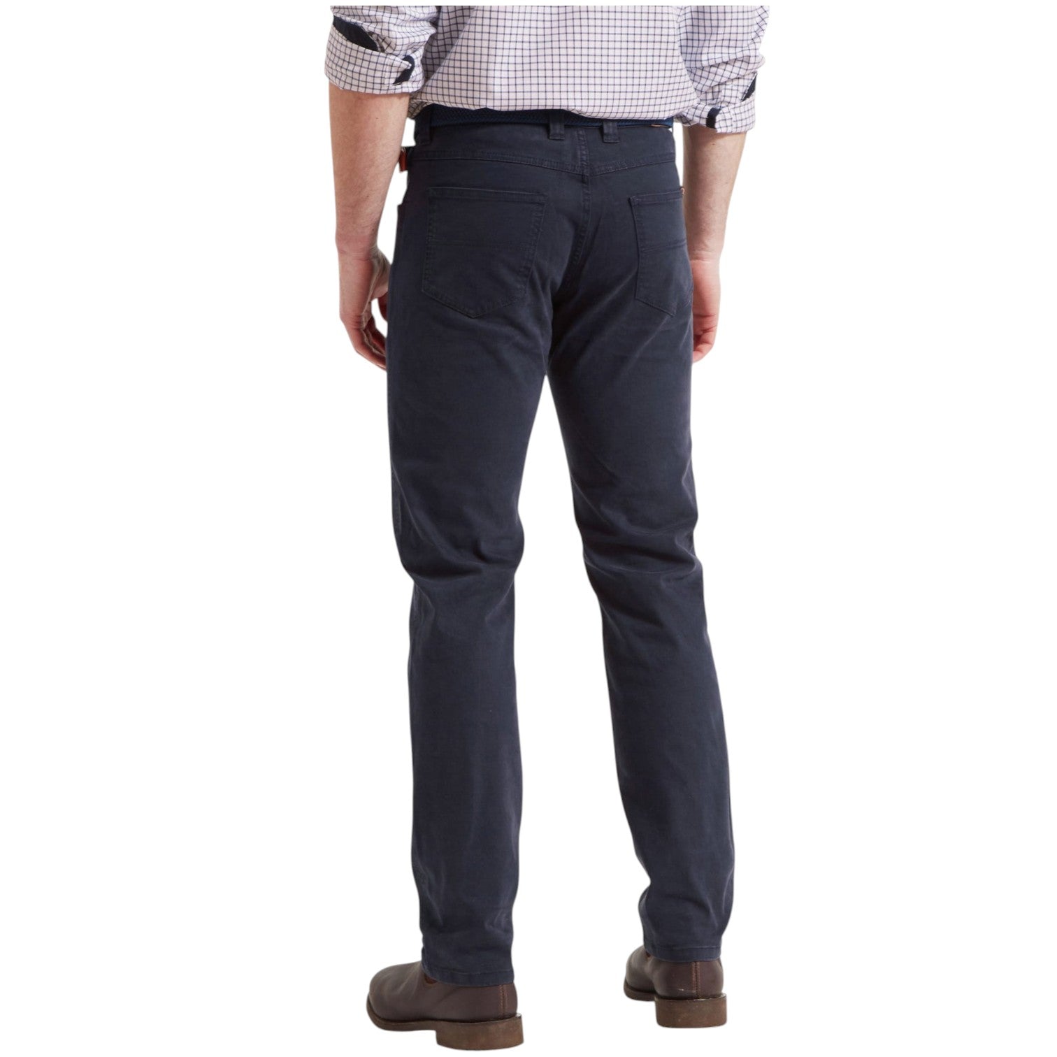 Person wearing dark gray pants on a white background