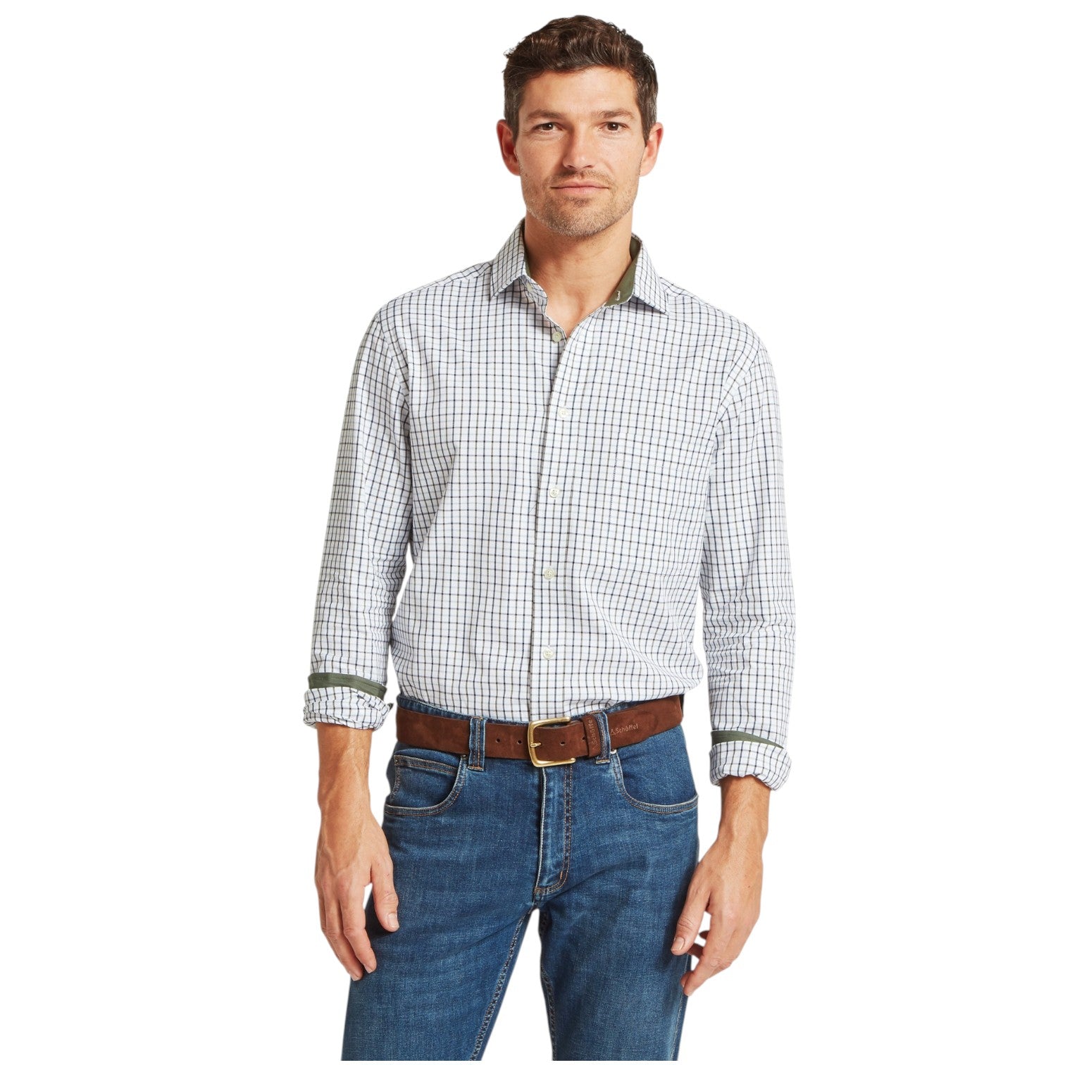 Man wearing a checkered shirt and jeans on a white background