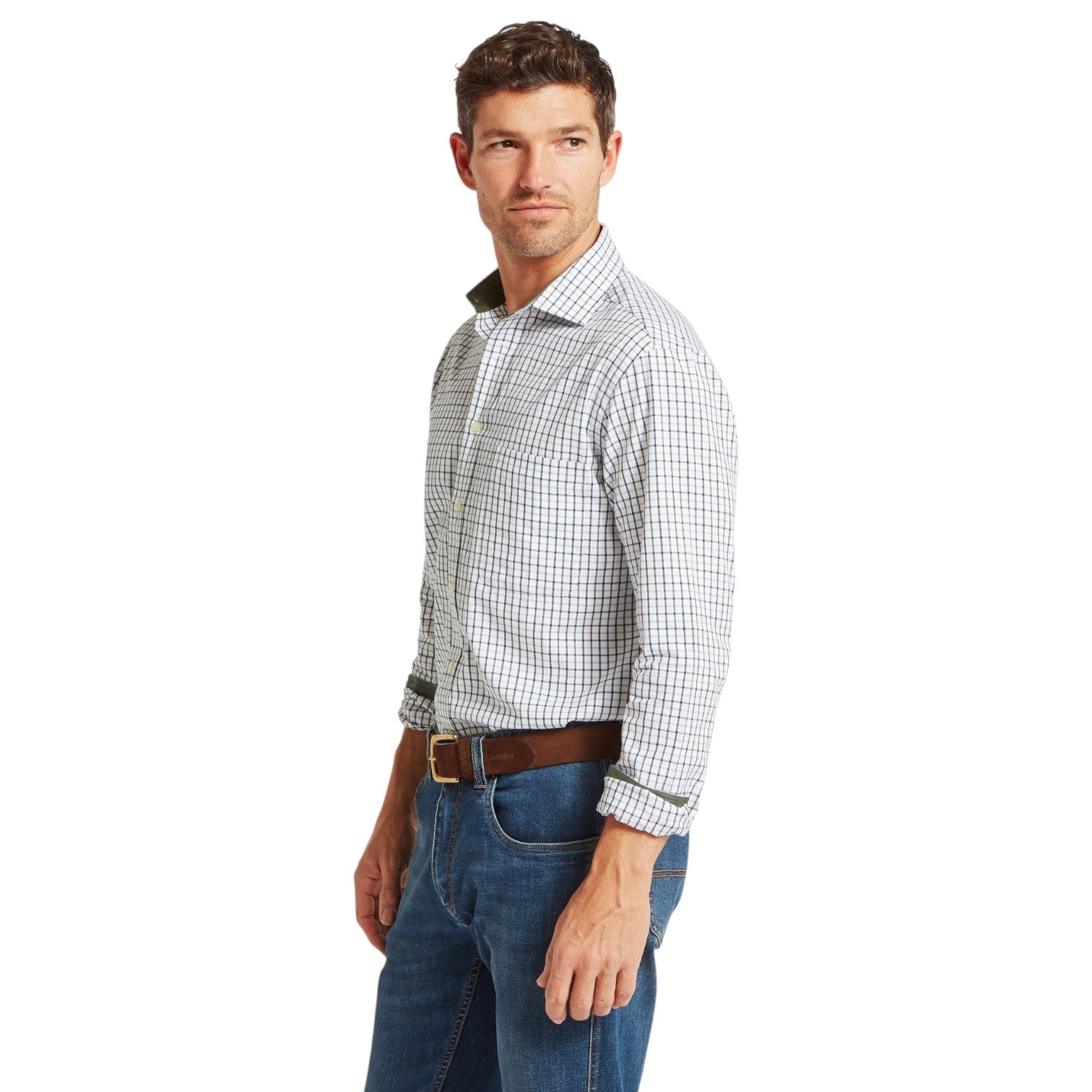 Man wearing a checkered shirt and jeans on a white background