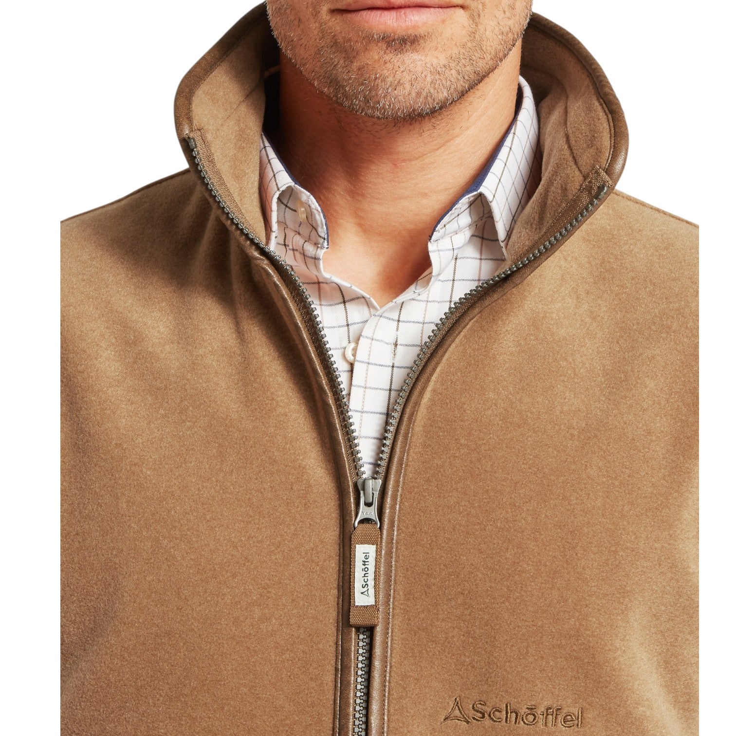 Brown fleece vest worn by a person with a visible brand logo on a white background