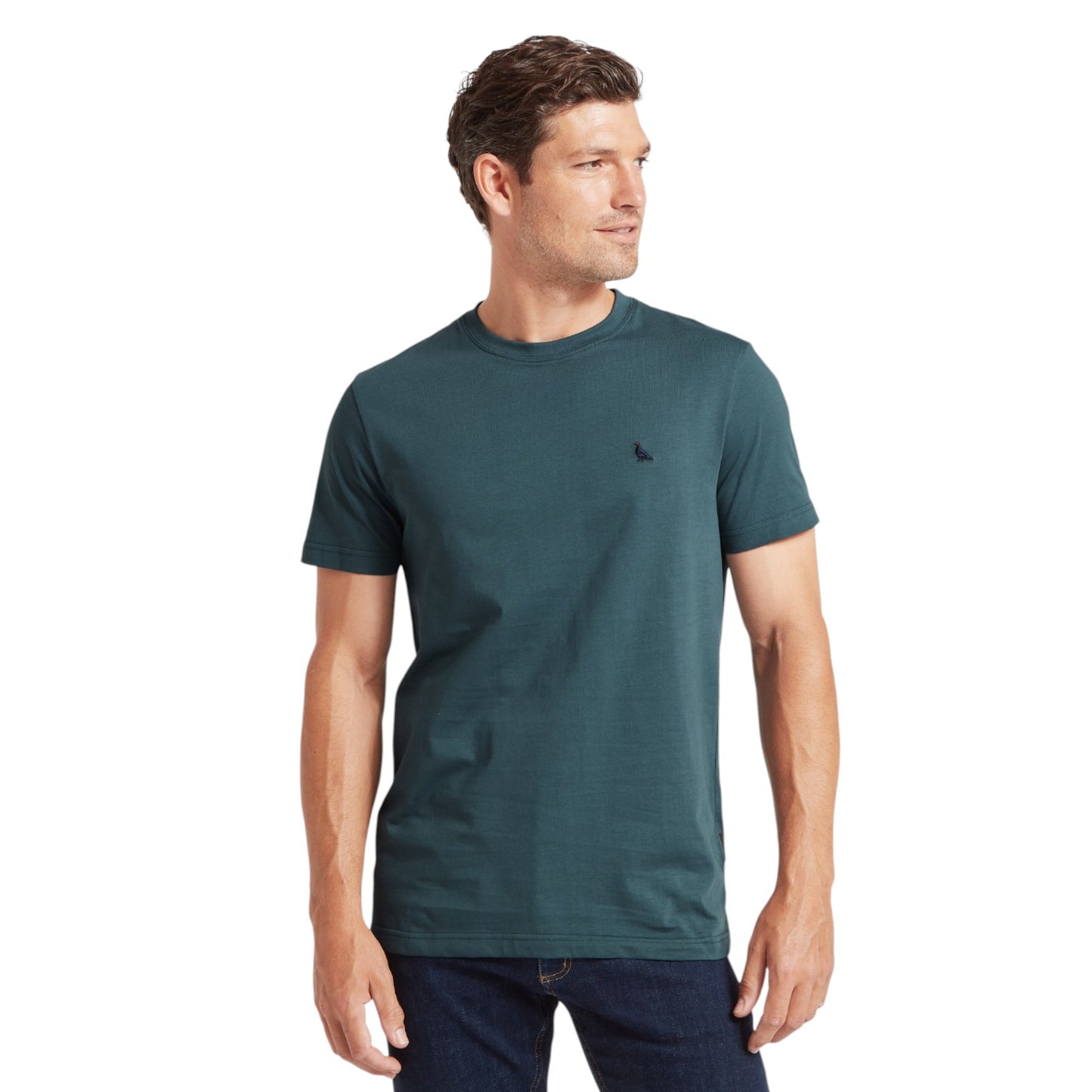 Man wearing a teal t-shirt on a white background
