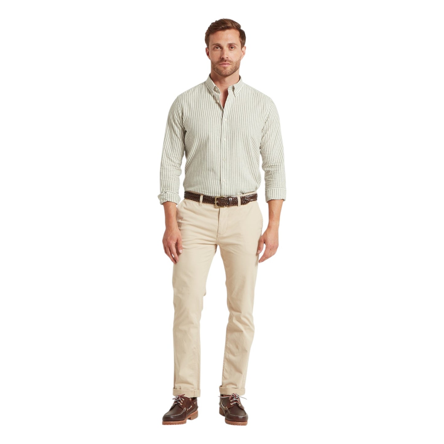 Man wearing a light green checkered shirt, beige pants, and brown shoes on a white background