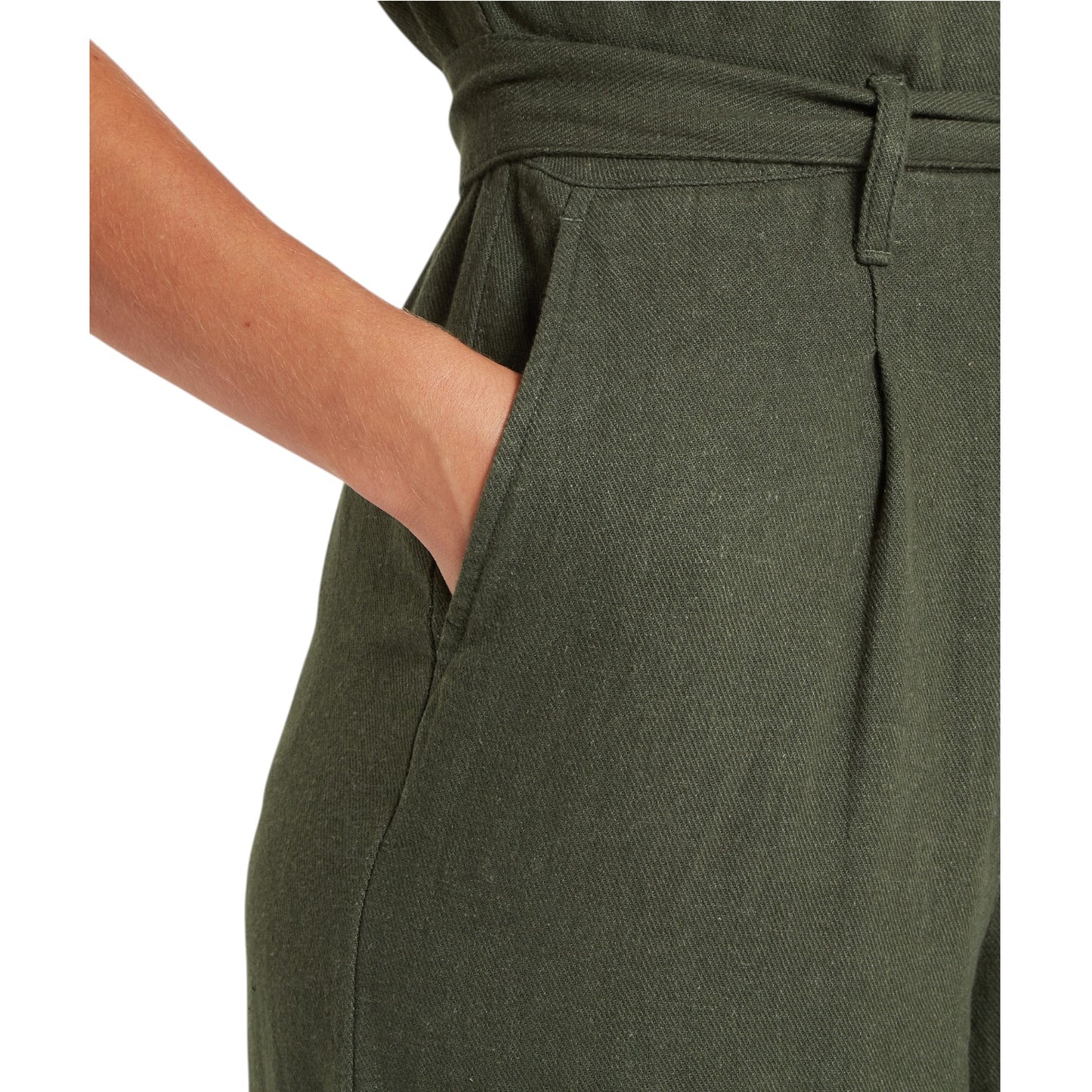 Close-up of green pants with a belt on a white background