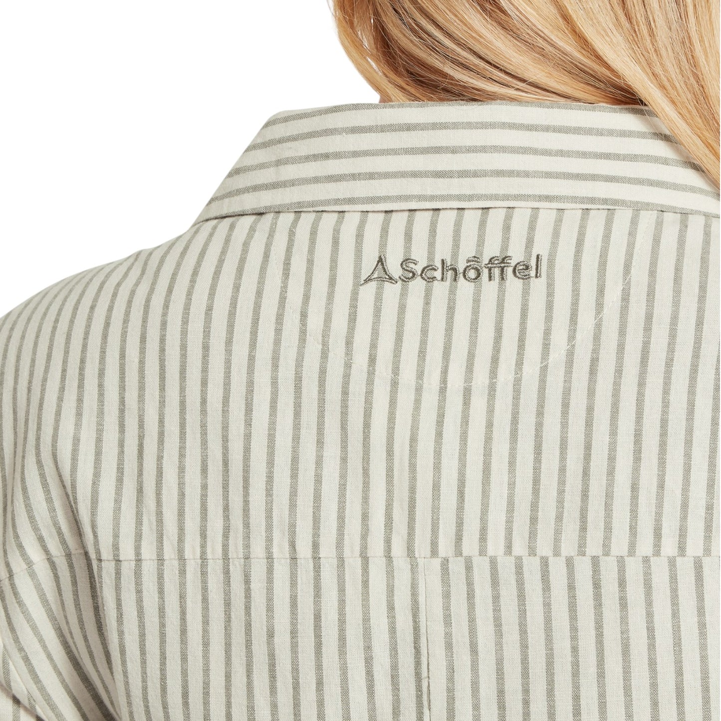 Close-up of a striped shirt with 'Schoffel' logo on a white background