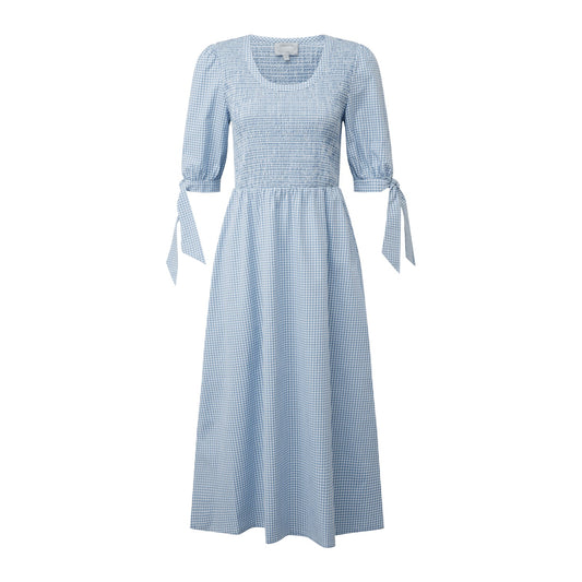 Blue checkered dress with puff sleeves and ribbon details on a white background