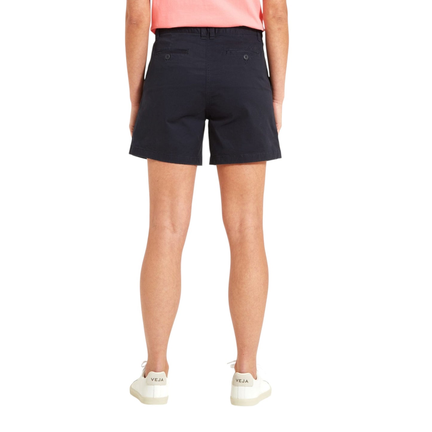 Person wearing navy shorts on a white background