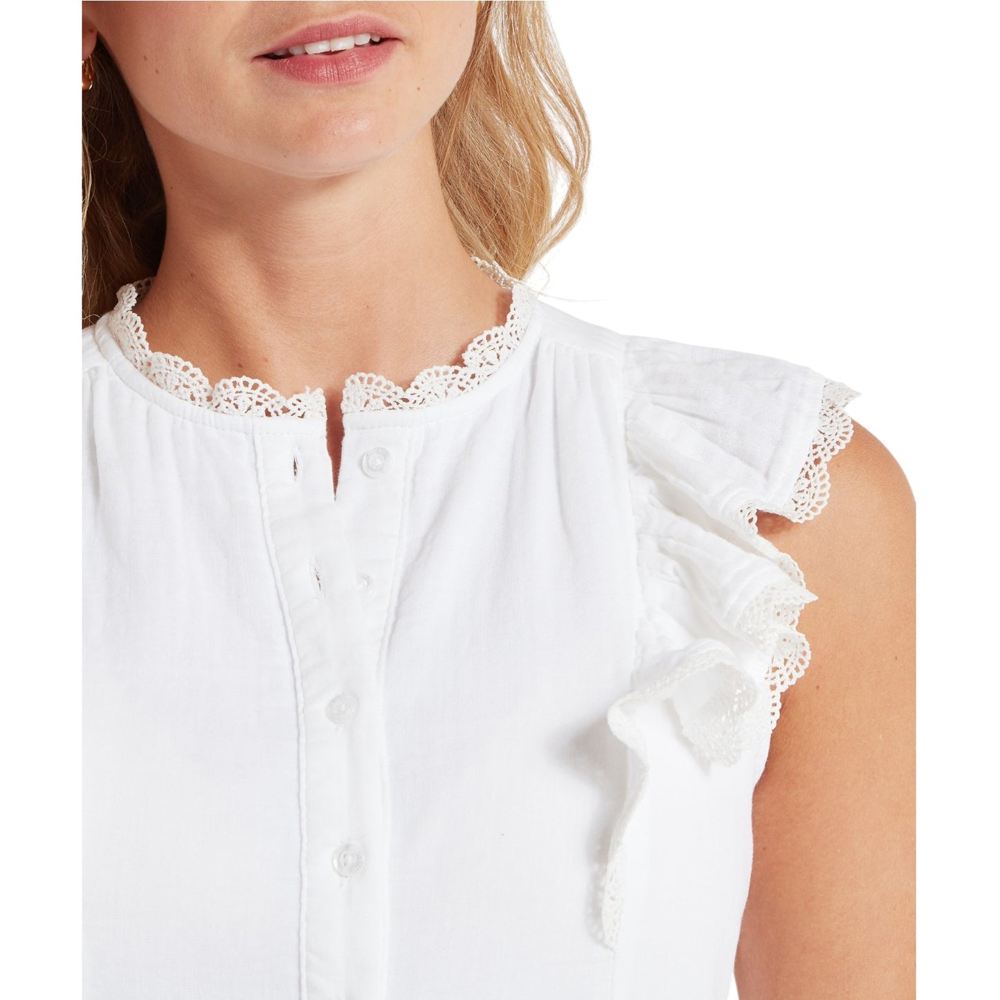 White blouse with lace details on a white background