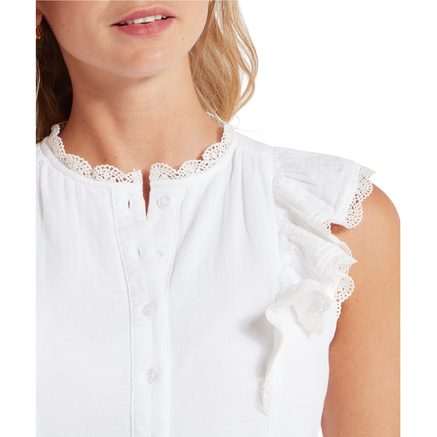 White blouse with lace details on a white background