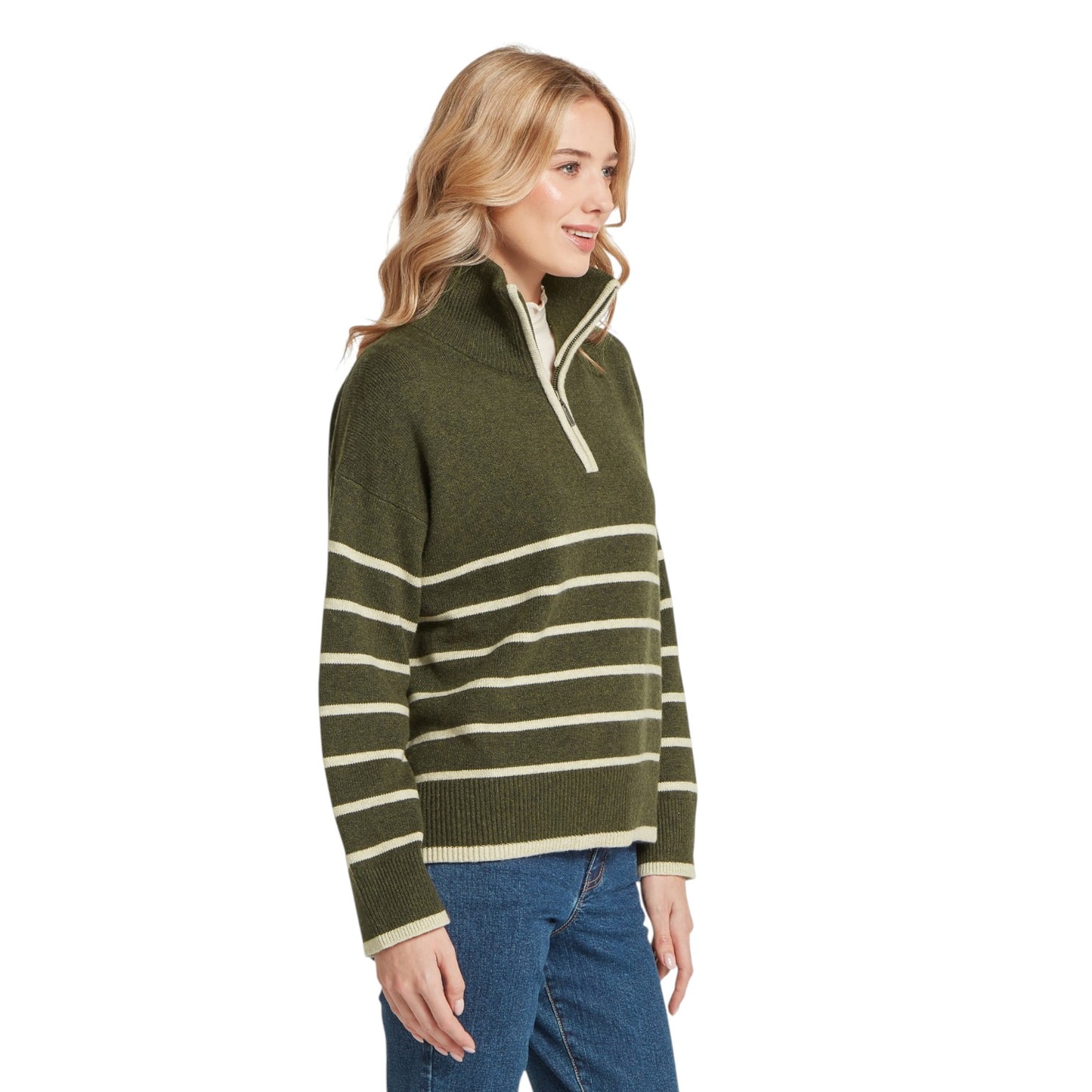 Woman wearing a green and beige striped sweater on a white background