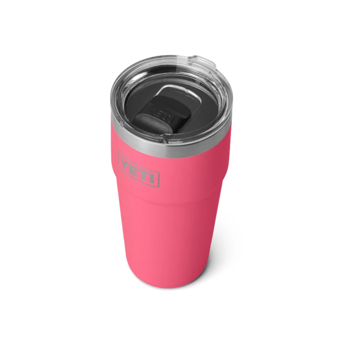 A pink YETI insulated tumbler with a clear lid and black interior, shown on a clean white background.