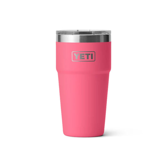A pink YETI insulated tumbler with a stainless steel lid, shown on a clean white background.