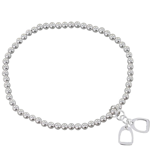 Silver beaded bracelet with a horse bit charm on a white background