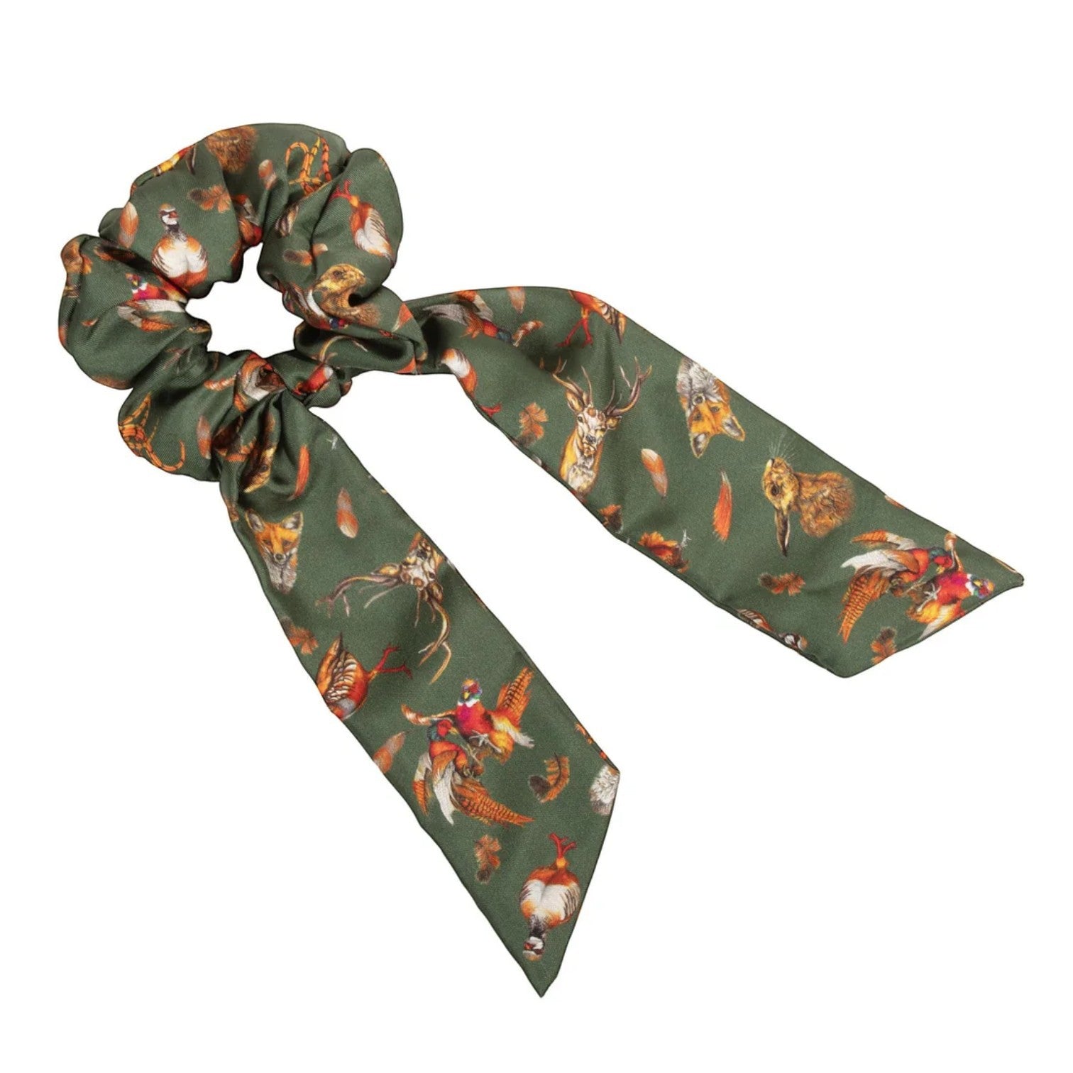 Green scrunchie with nature-themed design on a white background